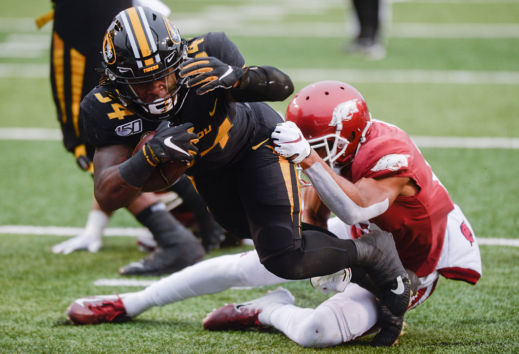 Larry Roundtree III dives into the end zone